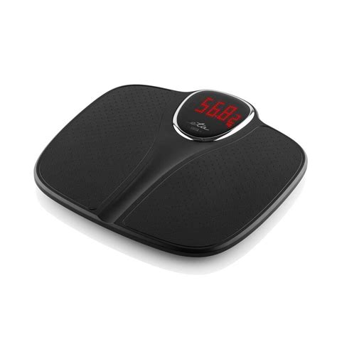 Ilustračná fotografia digitálnej osobnej váhy Tanita s displejom zobrazujúcim rôzne telesné parametre.